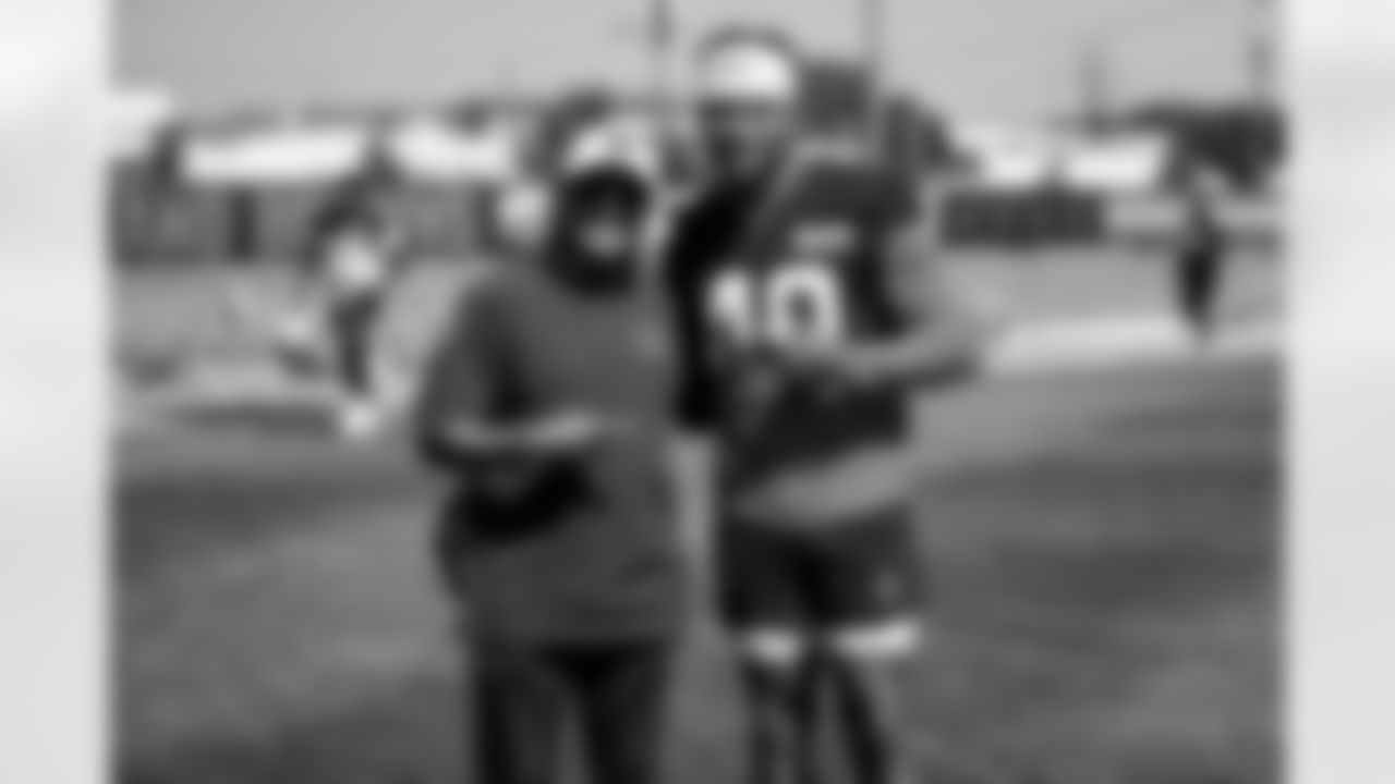 Safeties Coach Ephraim Banda and Linebacker Bookie Watson (40) during OTA 1 at CrossCountry Mortgage Campus on May 21, 2024.