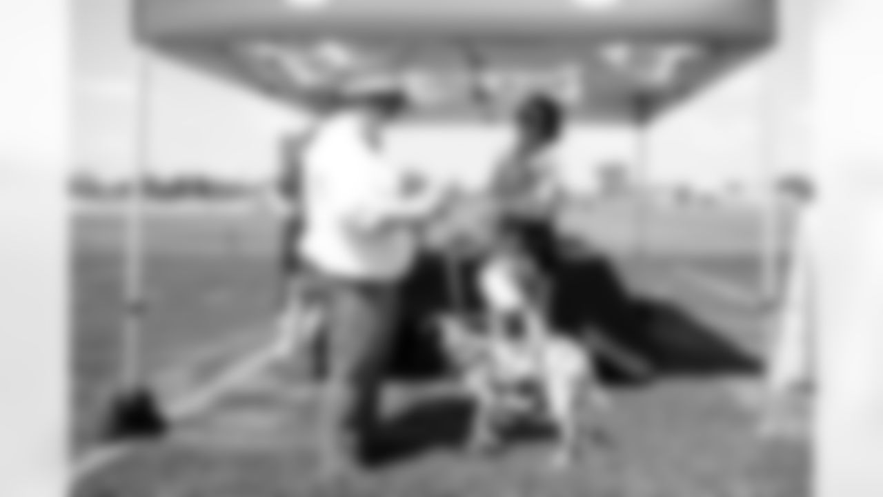 The 2025 Turf & Tails Barking Backers event at CrossCountry Mortgage Campus on June 22, 2025.