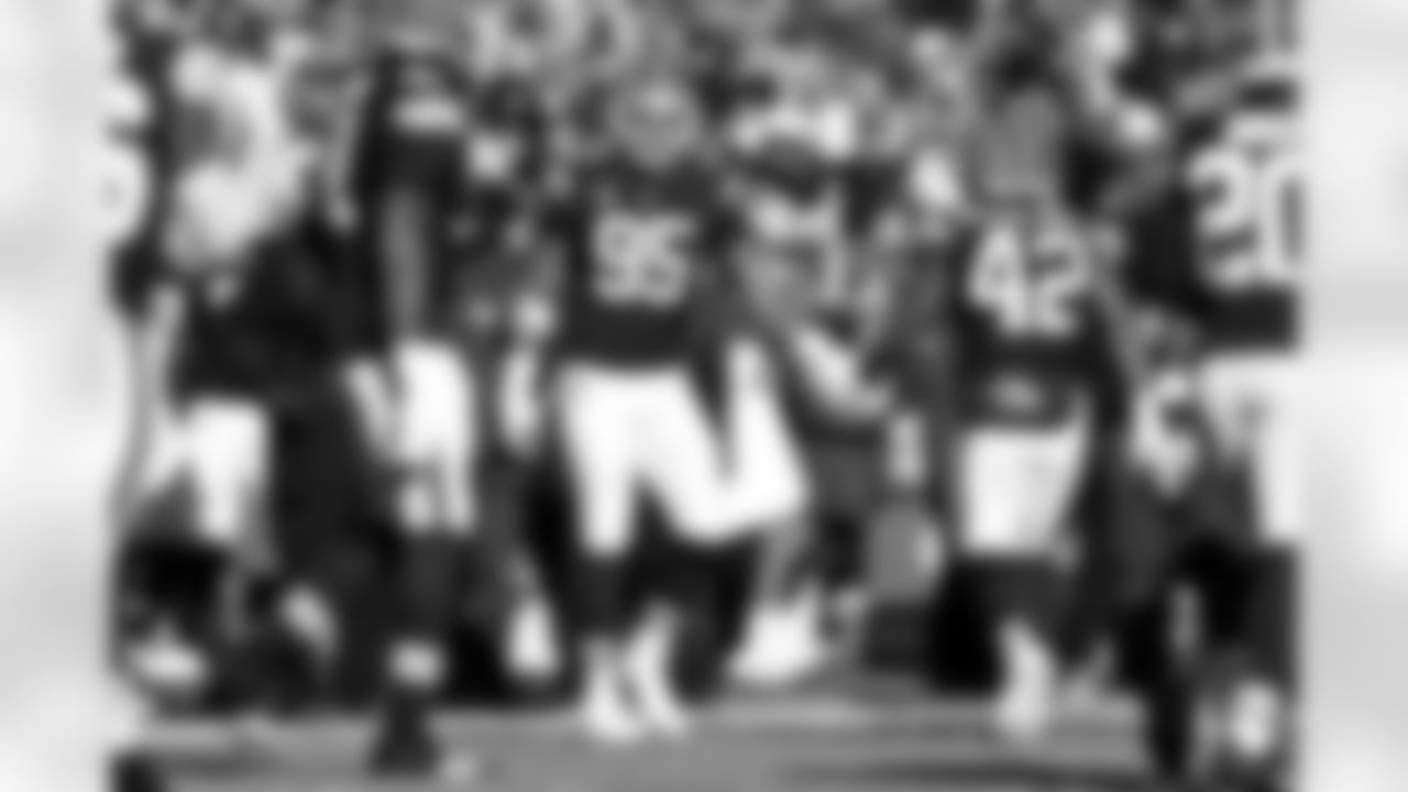 Defensive end Myles Garrett (95) and Linebacker Easton Mascarenas-Arnold (42) during a NFL football game between the Buffalo Bills and Cleveland Browns on December 21, 2025 at Huntington Bank Field.