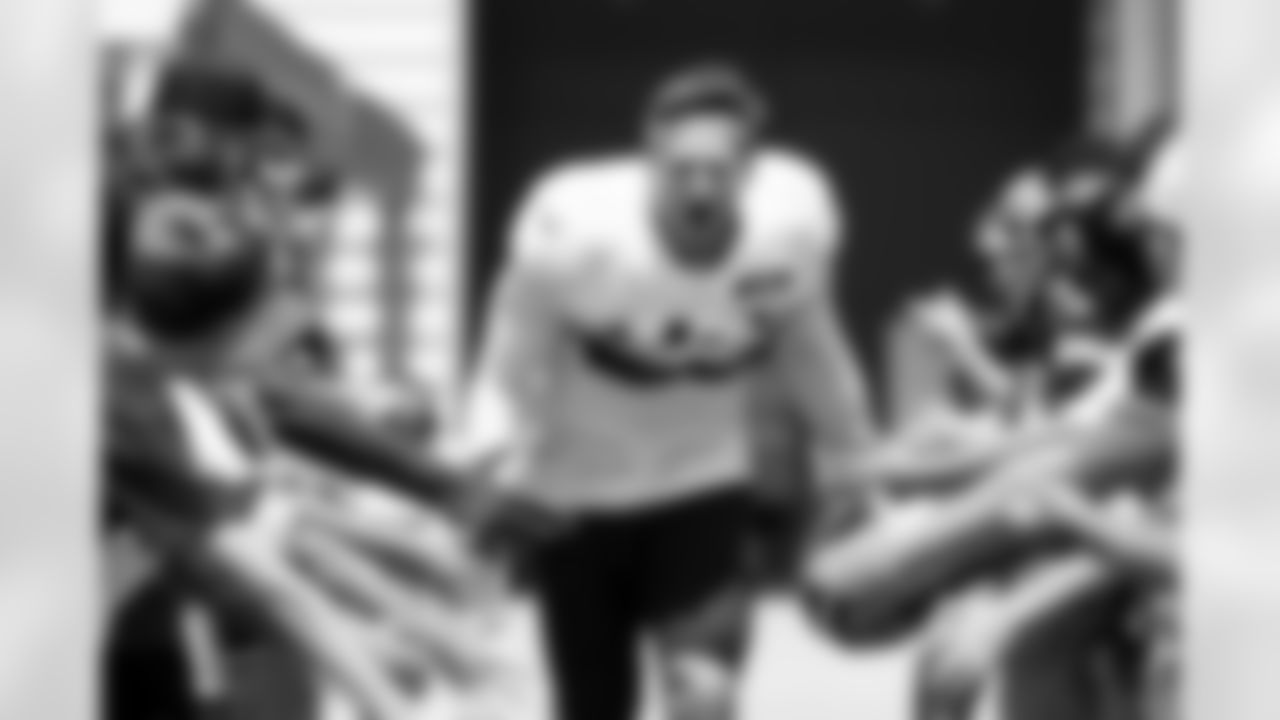 Defensive end Cameron Thomas (99)