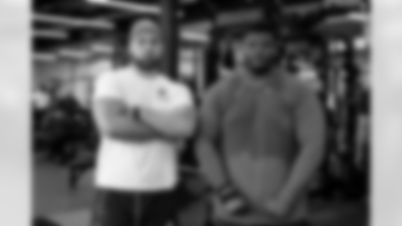 Offensive tackle Lorenzo Thompson (69) and Offensive guard Javion Cohen (67) during a workout in Phase II of the offseason at CrossCountry Mortgage Campus on May 21, 2025.