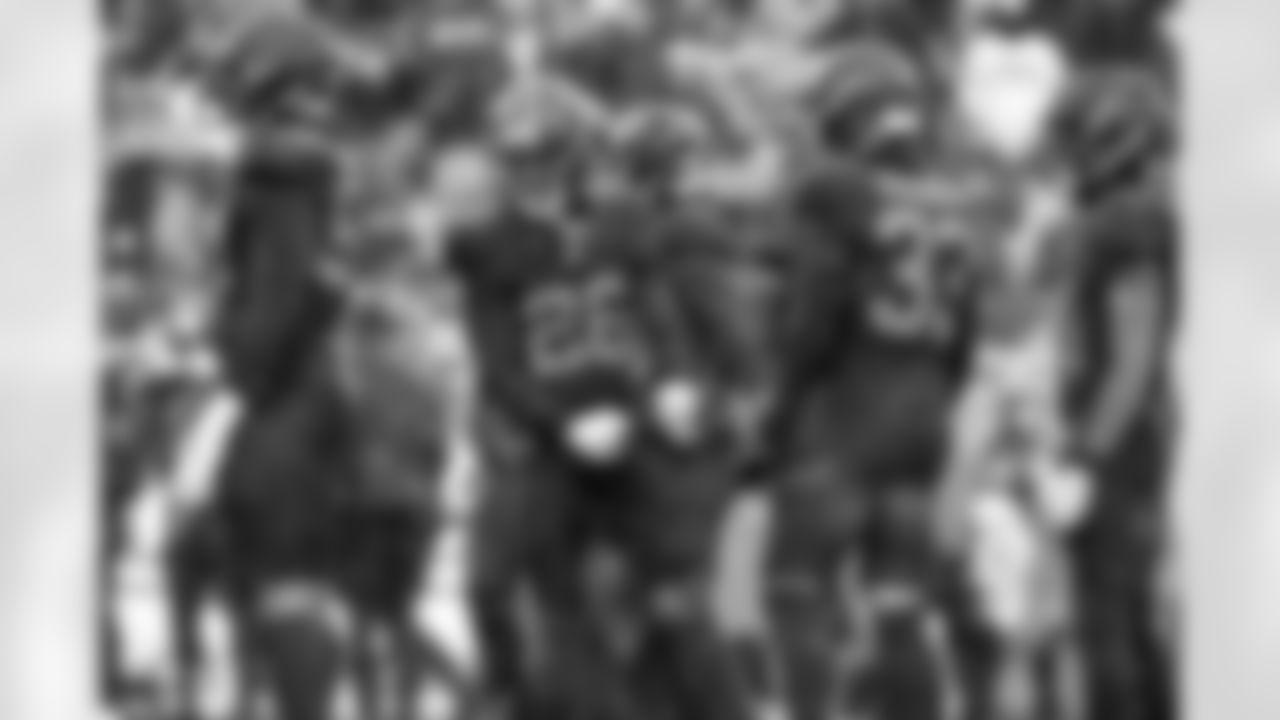 Cornerback Myles Harden (26) and Safety Ronnie Hickman Jr. (33) during a NFL football game between the Tennessee Titans and Cleveland Browns on December 7, 2025 at Huntington Bank Field.