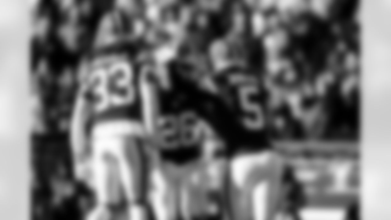 Safety Ronnie Hickman Jr. (33), Cornerback Myles Harden (26), Safety Rayshawn Jenkins (5) during a NFL football game between the Buffalo Bills and Cleveland Browns on December 21, 2025 at Huntington Bank Field.