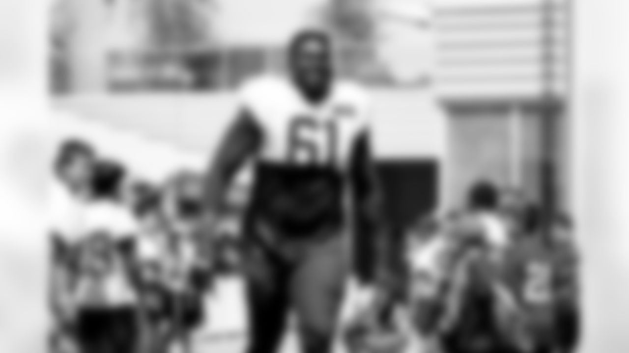 Offensive tackle Roy Mbaeteka (61)