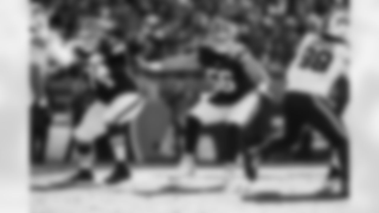 Offensive guard Teven Jenkins (74) and Center Luke Wypler (56) during a NFL football game between the Buffalo Bills and Cleveland Browns on December 21, 2025 at Huntington Bank Field.