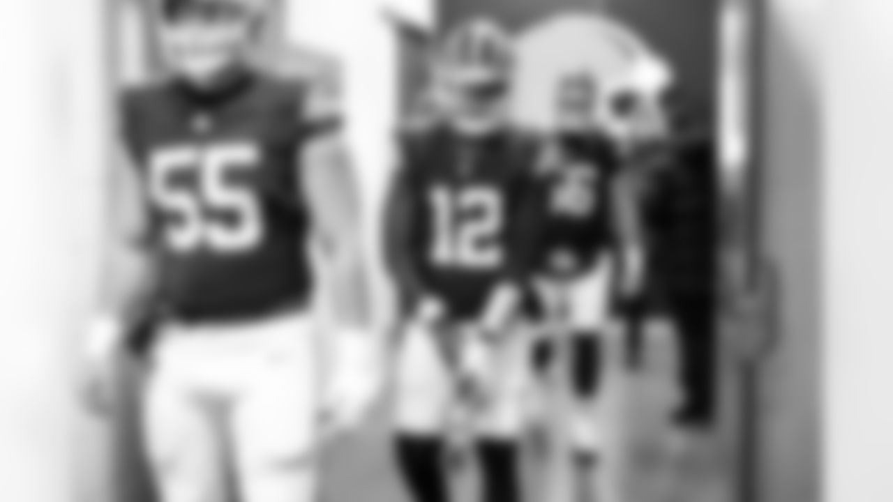 Center Ethan Pocic (55) and Quarterback Shedeur Sanders (12) before a NFL football game between the San Francisco 49ers and Cleveland Browns on November 30, 2025 at Huntington Bank Field.