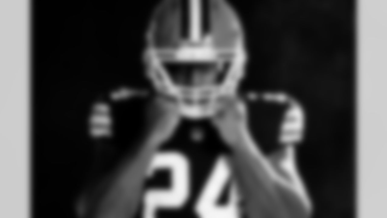 Running back Nick Chubb (24) poses for a photoshoot at CrossCountry Mortgage Campus on April 15, 2024.
