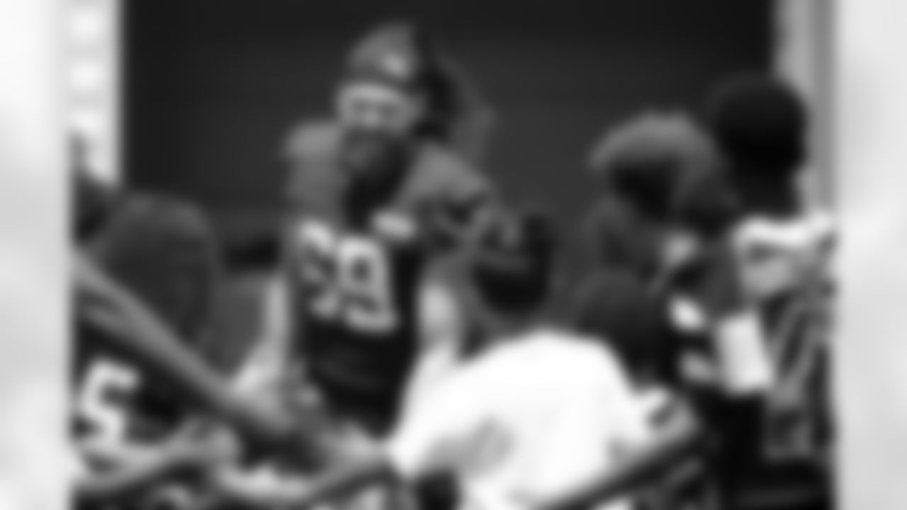Offensive tackle Lorenzo Thompson (69)