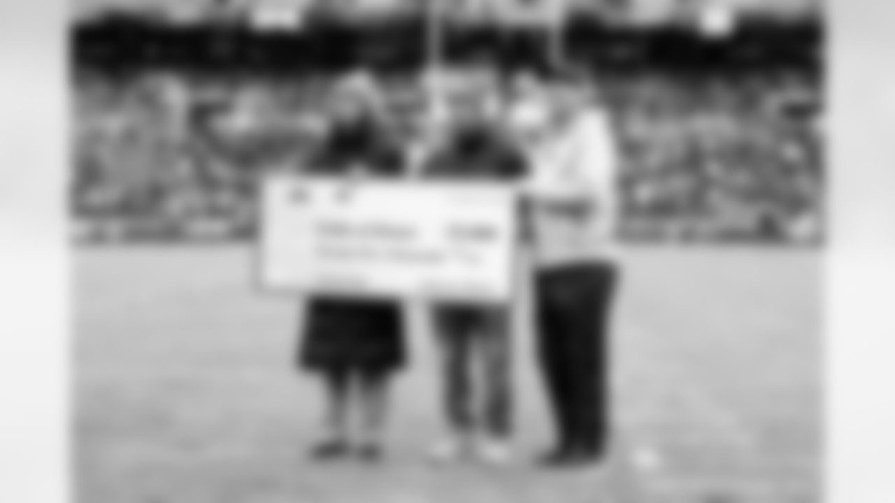 The Folds of Honor Check Presentation before a NFL football game between the San Francisco 49ers and Cleveland Browns on November 30, 2025 at Huntington Bank Field. The Browns lost 8-26.