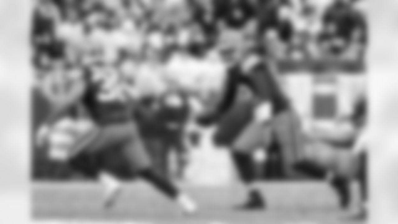 Running back Trayveon Williams (38) and Quarterback Shedeur Sanders (12) during a NFL football game between the Pittsburgh Steelers and Cleveland Browns on December 28, 2025 at Huntington Bank Field.