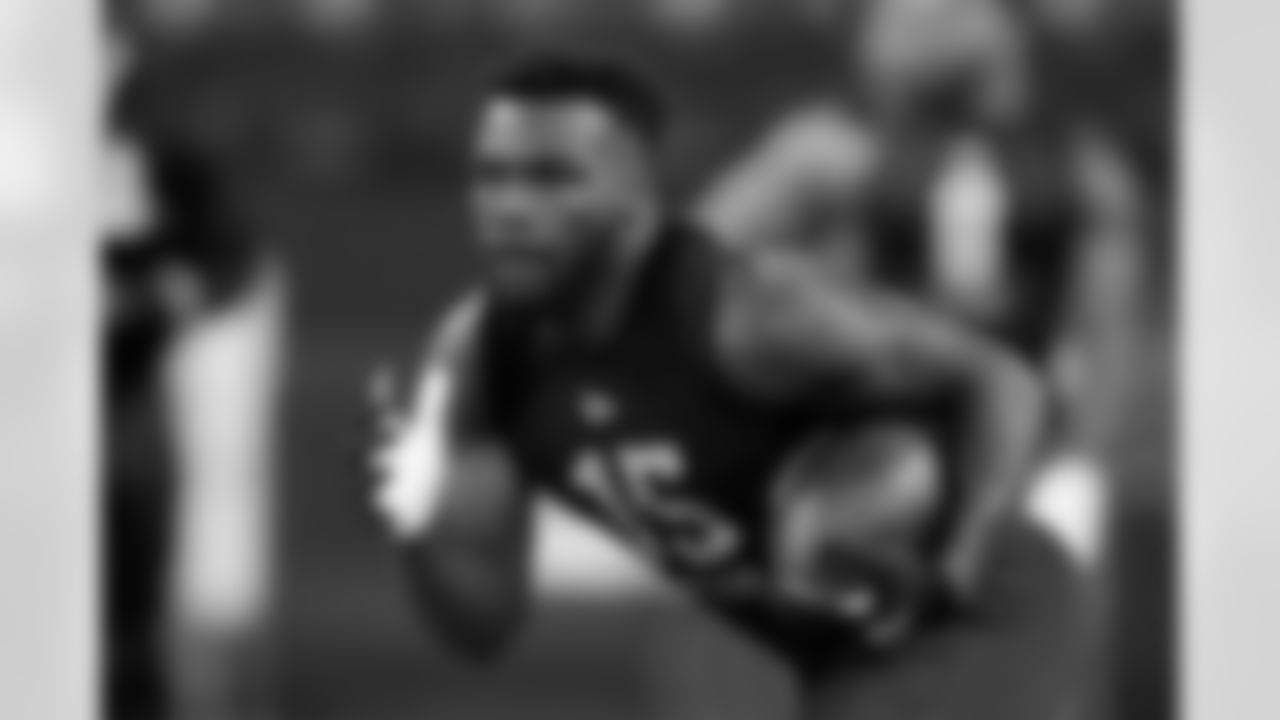 Cincinnati running back Jerome Ford runs a drill during the NFL football scouting combine, Friday, March 4, 2022, in Indianapolis. (AP Photo/Darron Cummings)