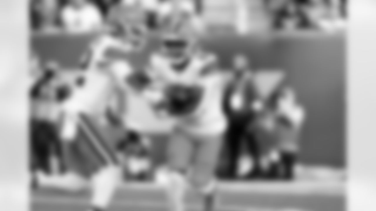 Quarterback Shedeur Sanders (12) and Running back Dylan Sampson (22) during a NFL football game between the Cleveland Browns and Cincinnati Bengals on January 4, 2026 at Paycor Stadium.