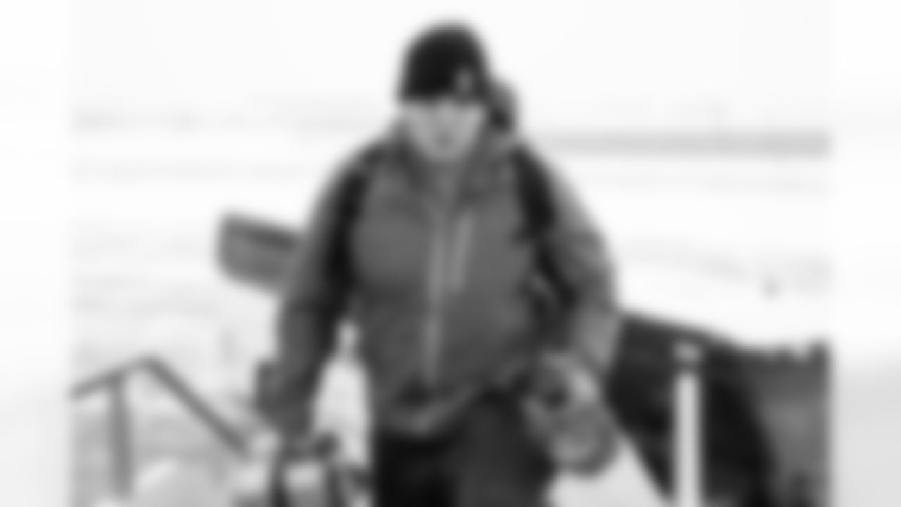 Center Luke Wypler (56) travels to Chicago on December 13, 2025.