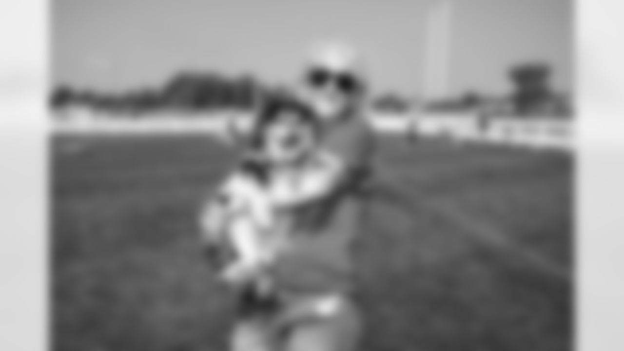 The 2025 Turf & Tails Barking Backers event at CrossCountry Mortgage Campus on June 22, 2025.
