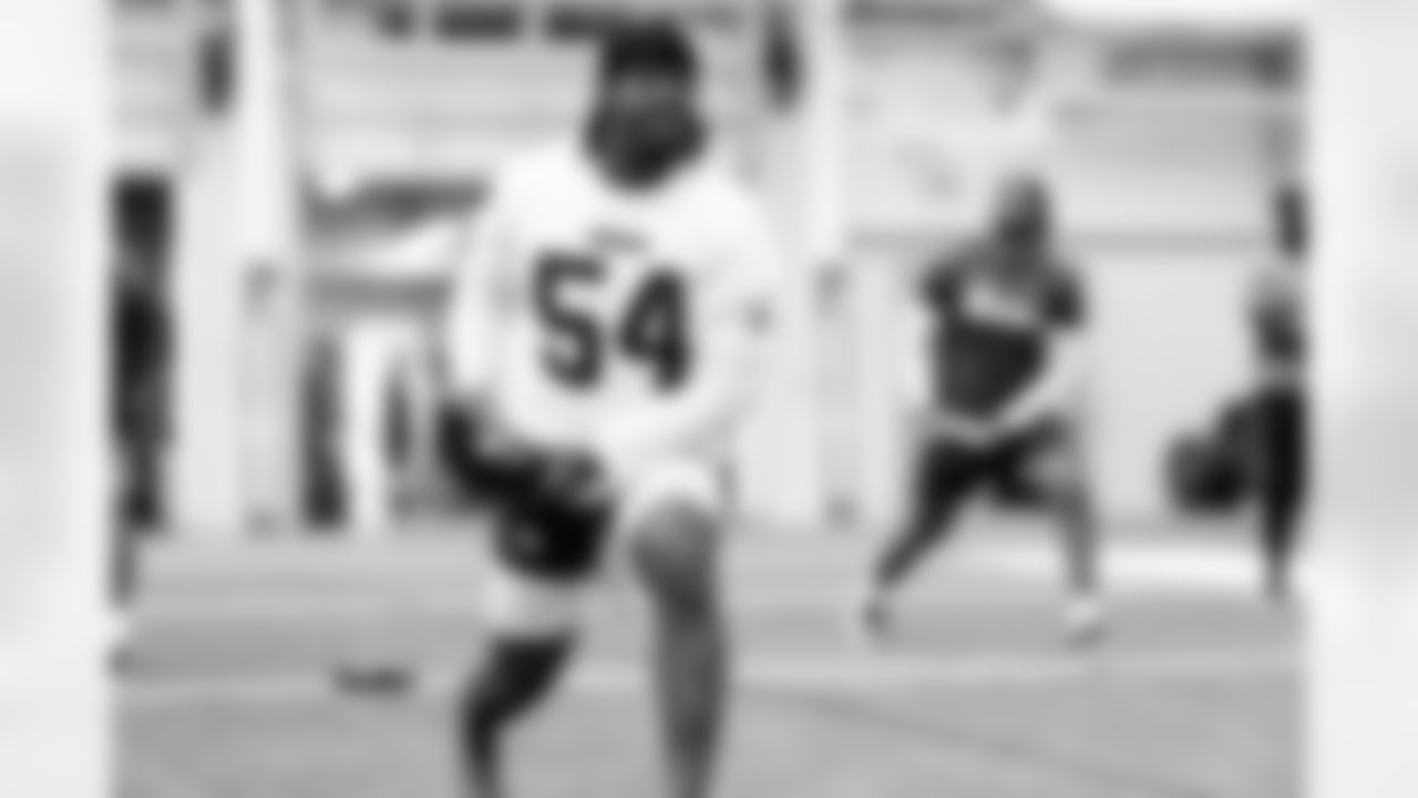 Defensive end Ogbo Okoronkwo (54) during a workout in Phase II of the offseason at CrossCountry Mortgage Campus on May 7, 2025.
