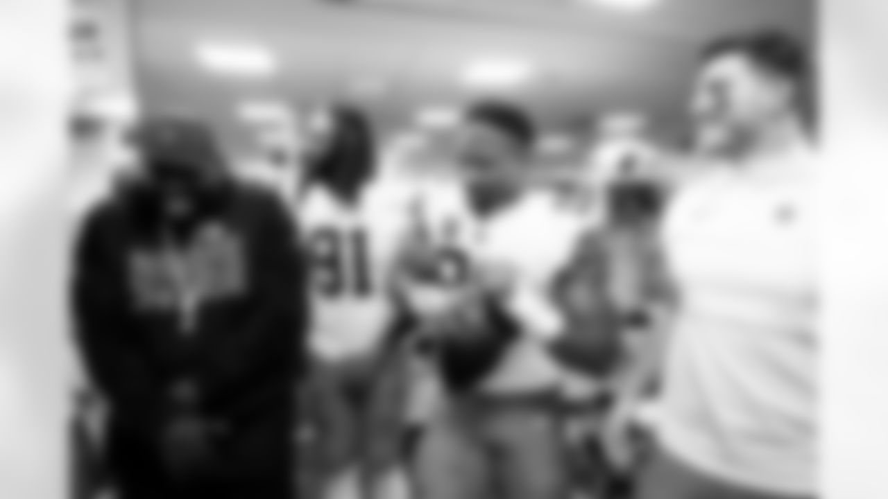 Defensive Line Coach Jacques Cesaire and Defensive end Myles Garrett (95) after a NFL football game between the Cleveland Browns and Cincinnati Bengals on January 4, 2026 at Paycor Stadium. The Browns won 20-18.