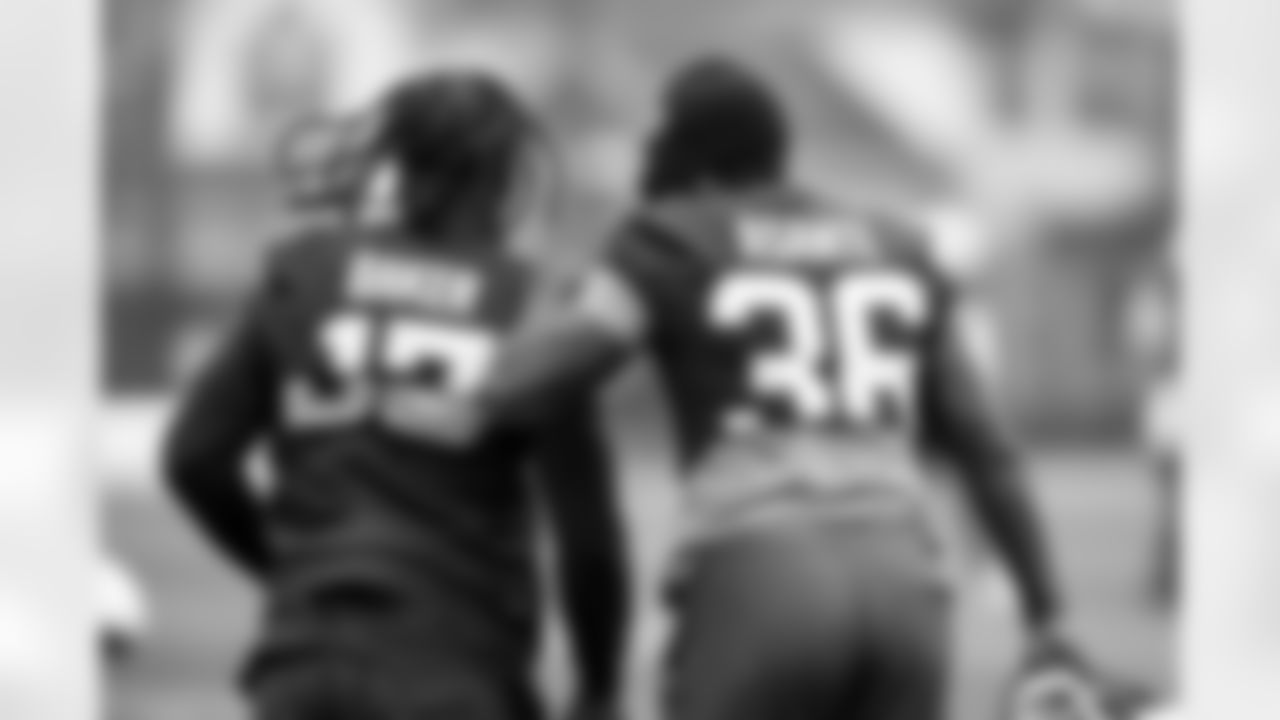 Linebacker Jerome Baker (17) and Linebacker Eugene Asante (36) during practice at CrossCountry Mortgage Campus on November 20, 2025.