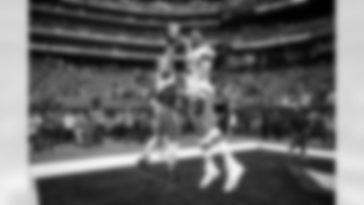 Tight end David Njoku (85) and Defensive end Myles Garrett (95) before a NFL Wild Card playoff football game between the Cleveland Browns and Houston Texans on January 13, 2024 at NRG Stadium.