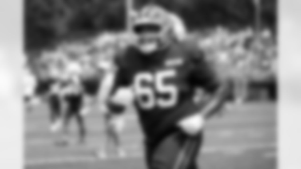 Offensive guard Dartanyan Tinsley (65) during Day 5 of Training Camp at CrossCountry Mortgage Campus on July 28, 2025.