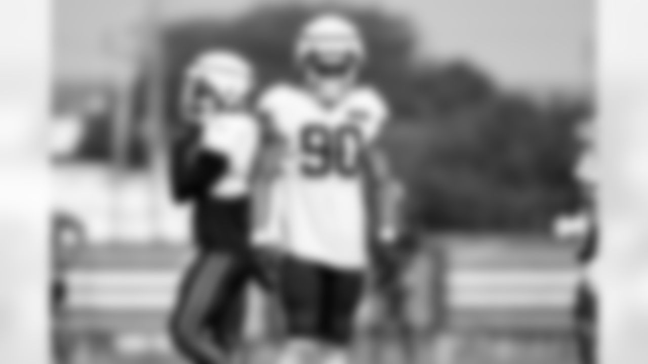 Defensive end Joe Tryon-Shoyinka (90) during Day 7 of Training Camp at CrossCountry Mortgage Campus on July 30, 2025.