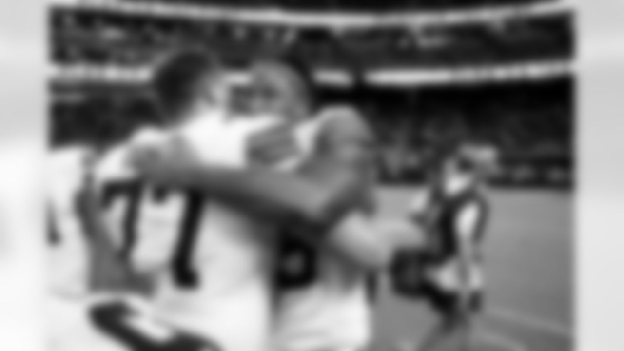 Offensive guard Wyatt Teller (77) and Defensive end Myles Garrett (95) during a NFL football game between the Cleveland Browns and Las Vegas Raiders on November 23, 2025 at Allegiant Stadium. The Browns won 24-10.