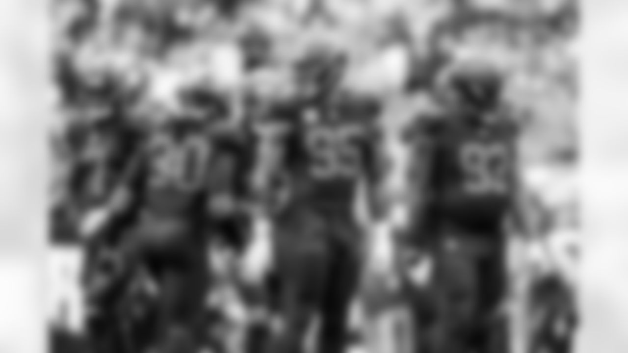 Linebacker Devin Bush (30), Defensive end Myles Garrett (95), and Defensive tackle Shelby Harris (93) during a NFL football game between the Miami Dolphins and Cleveland Browns on October 19, 2025 at Huntington Bank Field.