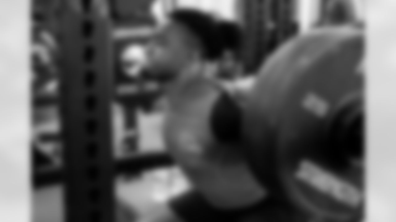 Defensive end Isaiah McGuire (57) during a workout in Phase I of the offseason at CrossCountry Mortgage Campus on April 29, 2025.