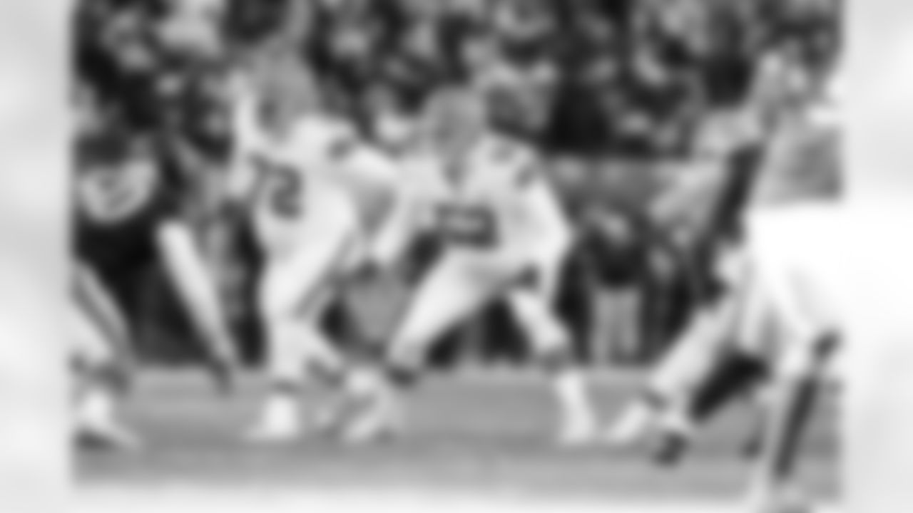 Offensive tackle KT Leveston (72) and Offensive lineman Garrett Dellinger (52) during a NFL football game between the Cleveland Browns and Chicago Bears on December 14, 2025 at Soldier Field.