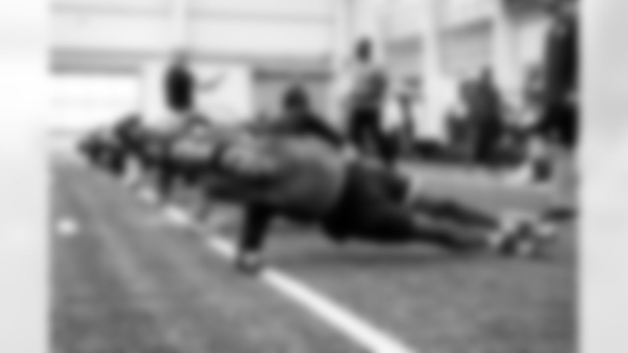 Defensive end Isaiah McGuire (57) during a workout in Phase I of the offseason at CrossCountry Mortgage Campus on April 29, 2025.