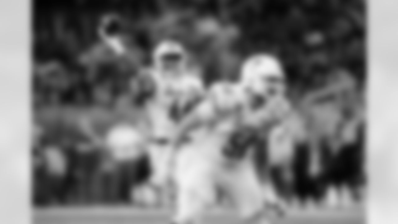 FILE - Bowling Green tight end Harold Fannin Jr. (44) throws a pass as Bowling Green offensive tackle Alex Wollschlaeger (50) looks to block against Minnesota during the Quick Lane Bowl NCAA college football game, Dec. 26, 2023, in Detroit. (AP Photo/Al Goldis, File)