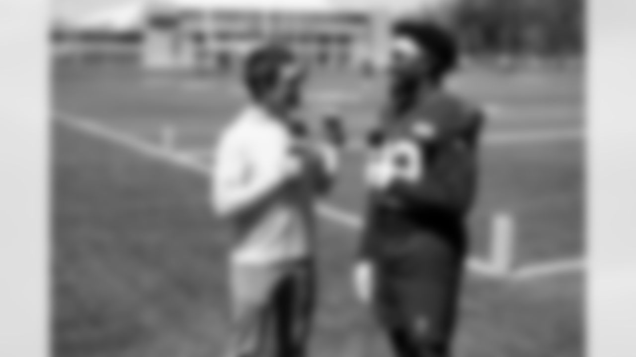 Andrew Siciliano and Running back Dylan Sampson (22) on the first day of Rookie Minicamp at CrossCountry Mortgage Campus on May 9, 2025.