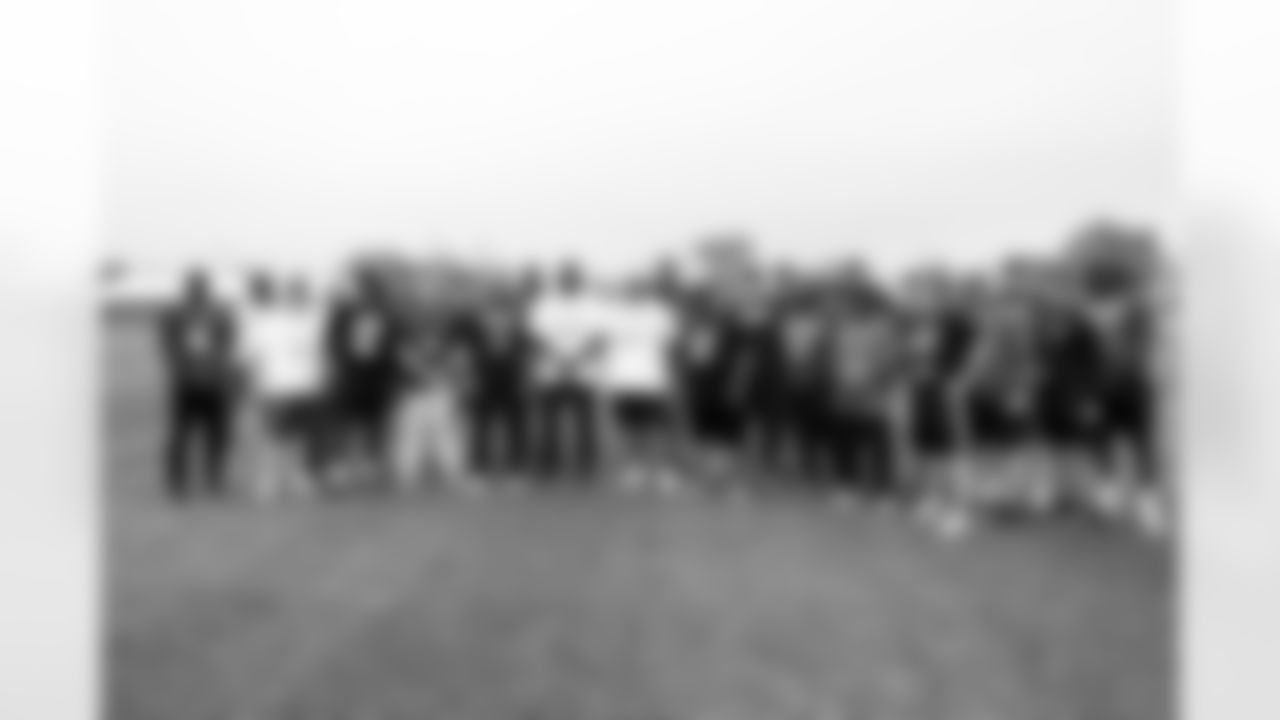Head Coach Kevin Stefanski and youth football guests during the sixth day of OTAs at CrossCountry Mortgage Campus on June 6, 2025.