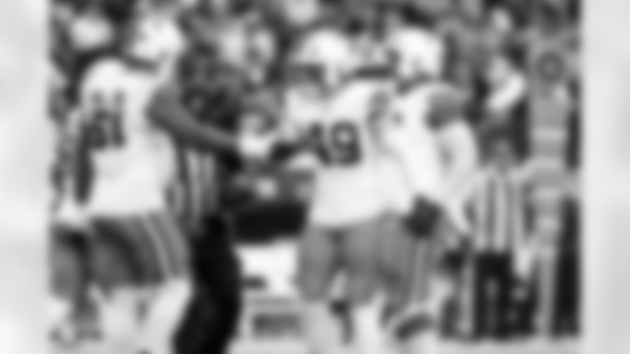 Defensive tackle Mike Hall Jr. (51) and Linebacker Carson Schwesinger (49) during a NFL football game between the Cleveland Browns and Las Vegas Raiders on November 23, 2025 at Allegiant Stadium. The Browns won 24-10.