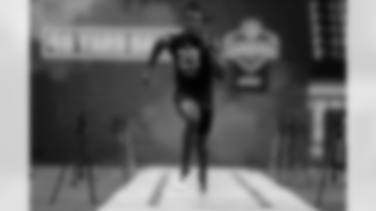 FILE - In this Feb. 27, 2020, file photo, Alabama wide receiver Jerry Jeudy runs the 40-yard dash at the NFL football scouting combine in Indianapolis. With their blazing speed on offense, the Kansas City Chiefs ran away from their AFC West brethren en route to their first Super Bowl title in half a century. The Broncos used their first two draft picks on speedy wide receivers Jerry Jeudy of Alabama and KJ Hamler of Penn State to keep up with the likes of Tyreek Hill and Sammy Watkins. (AP Photo/Michael Conroy, File)