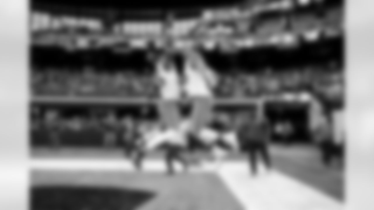 Tight end David Njoku (85) and Defensive end Myles Garrett (95) before a NFL football game between the Cleveland Browns and Las Vegas Raiders on November 23, 2025 at Allegiant Stadium.