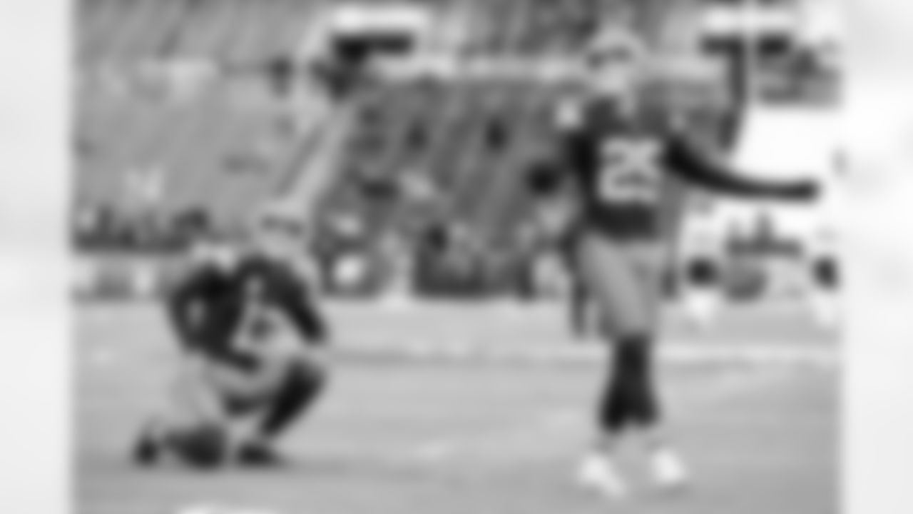 Punter Corey Bojorquez (13) and Kicker Andre Szmyt (25) before a NFL football game between the Baltimore Ravens and Cleveland Browns on November 16, 2025 at Huntington Bank Field.