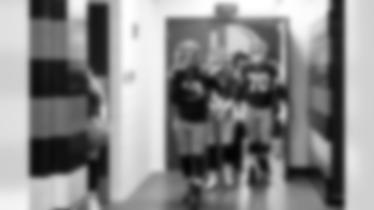 Quarterback Shedeur Sanders (12) and Offensive guard Zak Zinter (70) before a NFL football game between the Pittsburgh Steelers and Cleveland Browns on December 28, 2025 at Huntington Bank Field.