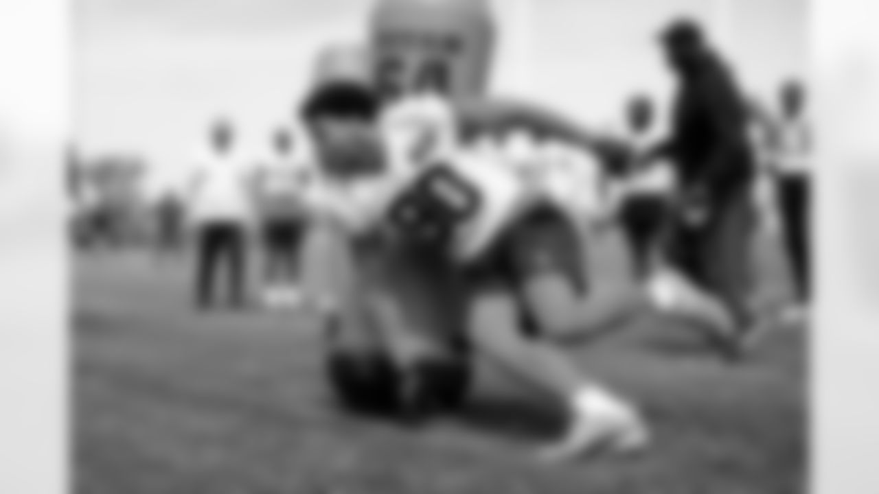 Defensive end Joe Tryon-Shoyinka (90) during fieldwork in Phase II of the offseason at CrossCountry Mortgage Campus on May 12, 2025.