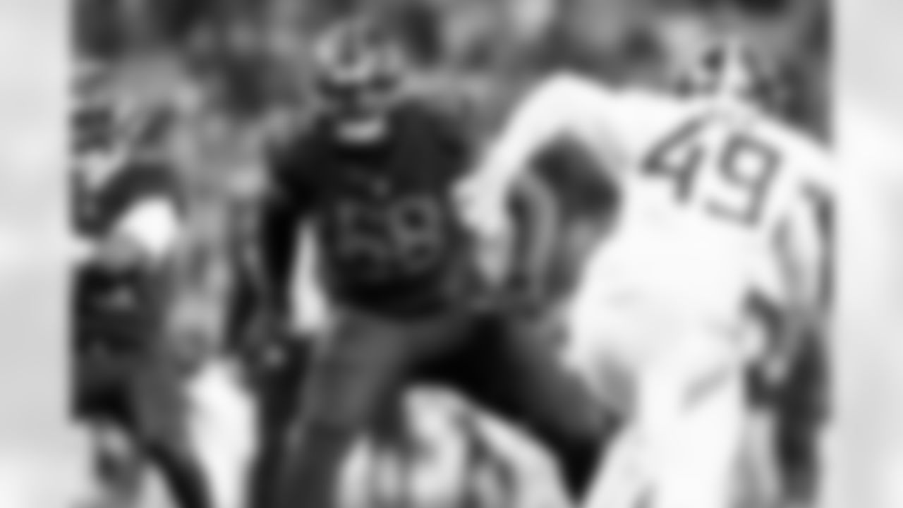 Offensive tackle Cam Robinson (68)