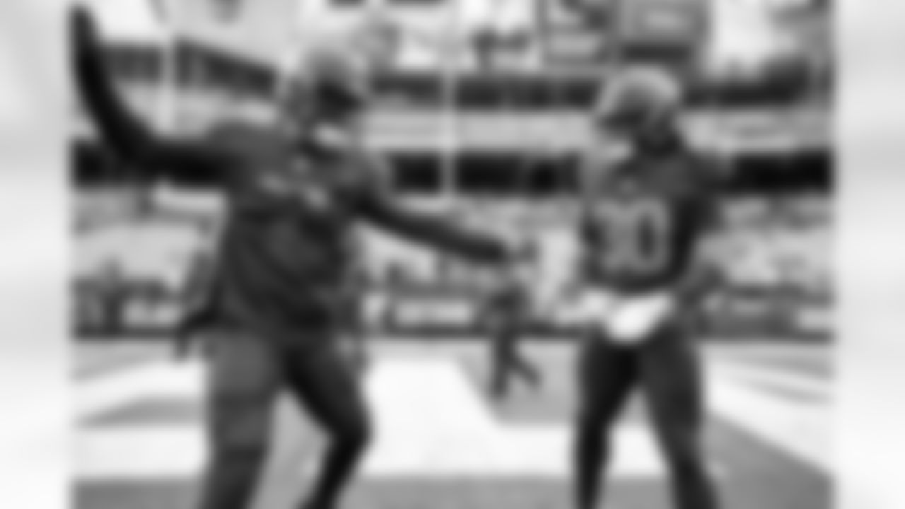 Linebacker Jerome Baker (17) and Linebacker Devin Bush (30) before a NFL football game between the Miami Dolphins and Cleveland Browns on October 19, 2025 at Huntington Bank Field.