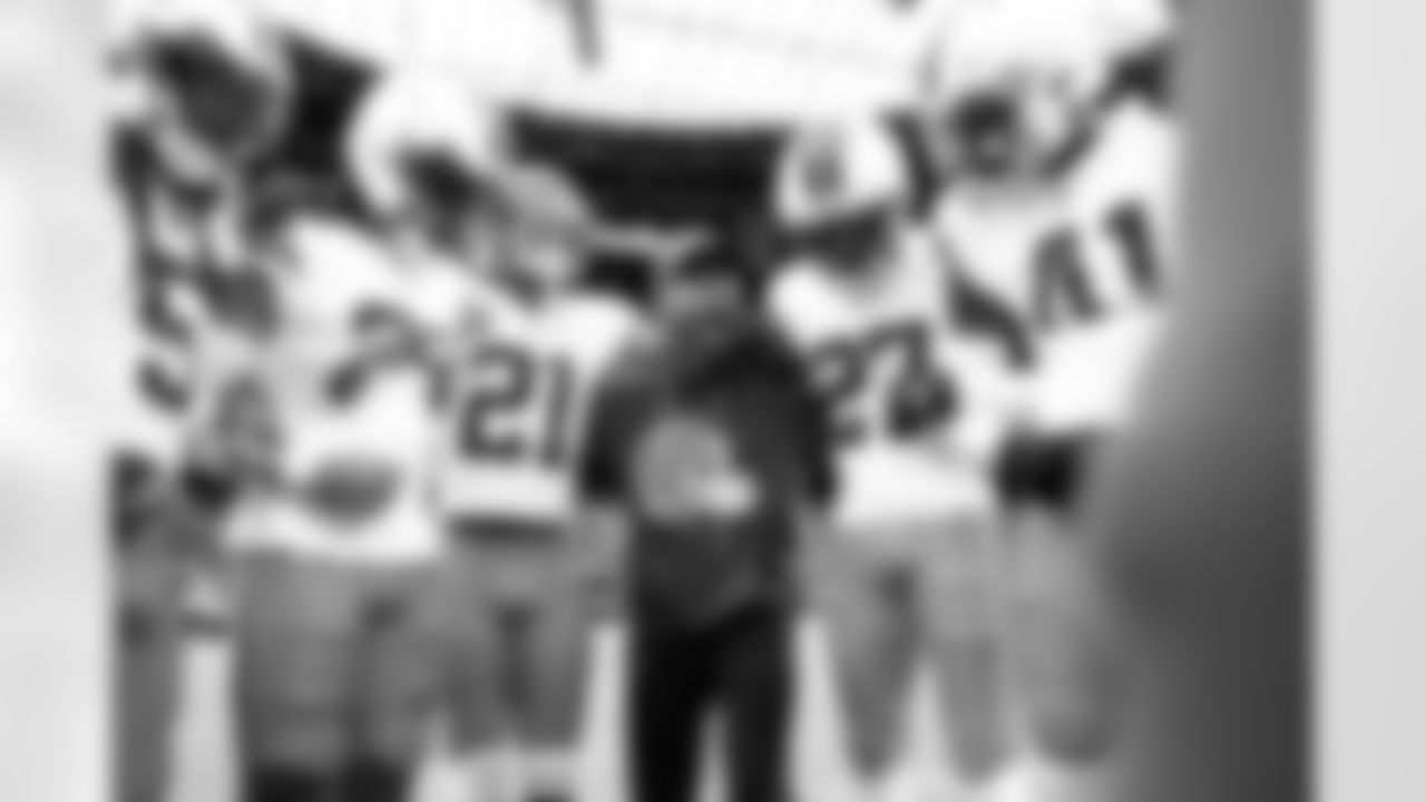 Safety Rayshawn Jenkins (5), Safety Ronnie Hickman Jr. (33), Cornerback Denzel Ward (21), Cornerbacks Coach Brandon Lynch, Cornerback Sam Webb (27), and Safety Christopher Edmonds (41) before a NFL football game between the Cleveland Browns and Las Vegas Raiders on November 23, 2025 at Allegiant Stadium.