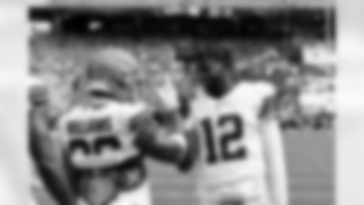 Running back Trayveon Williams (36) and Quarterback Shedeur Sanders (12) before a preseason NFL football game between the Los Angeles Rams and Cleveland Browns on August 23, 2025 at Huntington Bank Field.