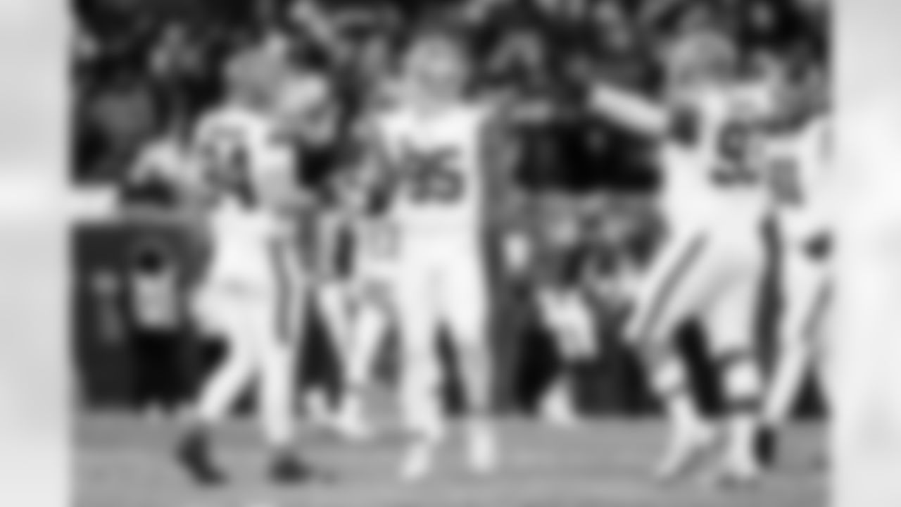 Defensive tackle Mason Graham (94), Defensive end Myles Garrett (95), and Defensive tackle Shelby Harris (93) during a NFL football game between the Cleveland Browns and Chicago Bears on December 14, 2025 at Soldier Field.