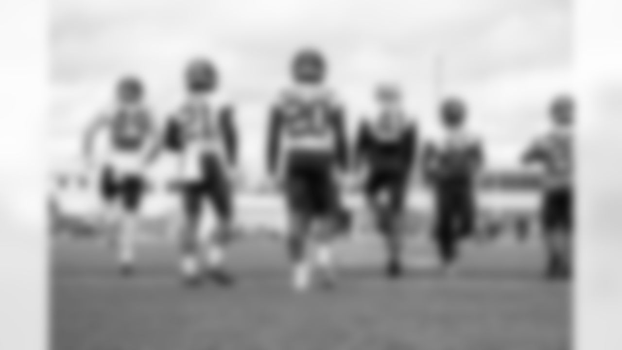 Cornerback Denzel Ward (21), Defensive back Jarrick Bernard-Converse (20) and Safety Christopher Edmonds (41) during practice at CrossCountry Mortgage Campus on October 15, 2025.