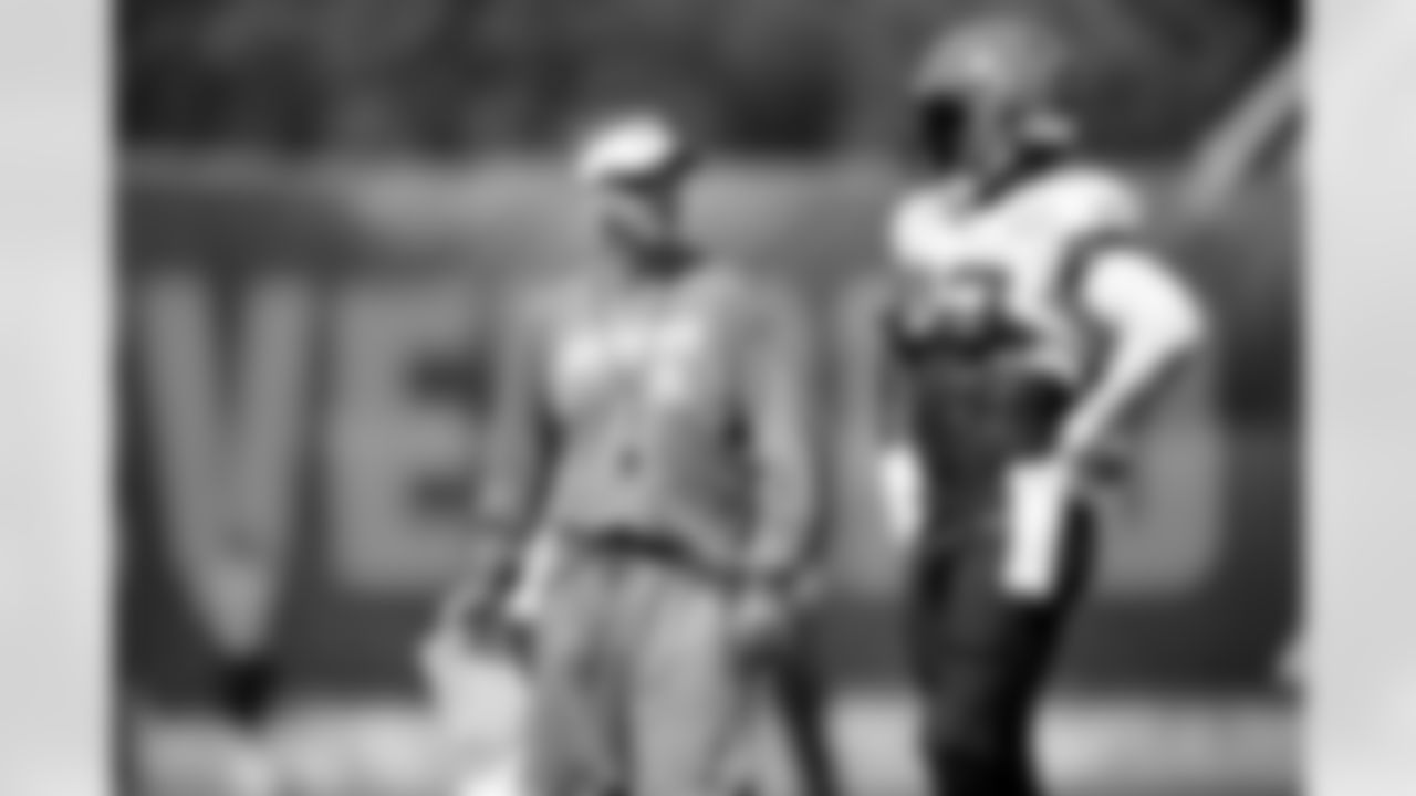 Offensive Coordinator Todd Monken and Tight end David Njoku (85) during the fifth day of training camp on July 29, 2019.