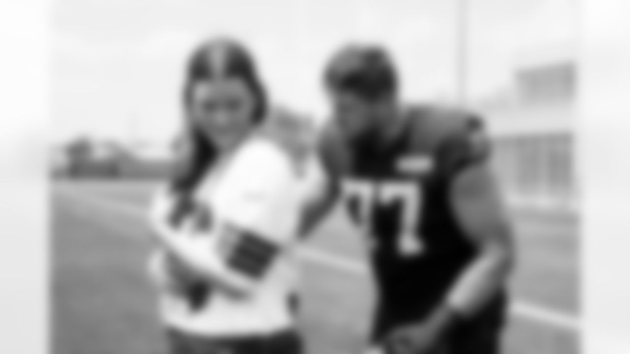 Offensive guard Wyatt Teller (77) and Browns Foundation guests during the fifth day of OTAs at CrossCountry Mortgage Campus on June 4, 2025.