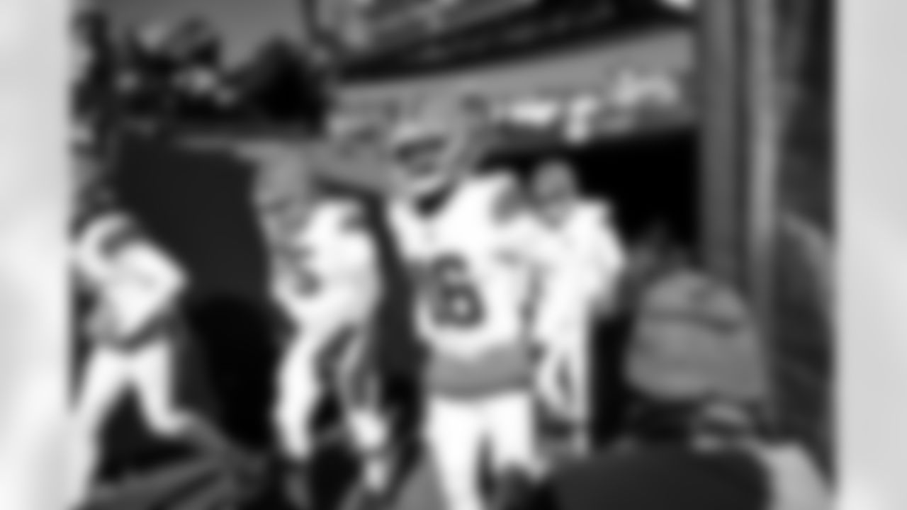 Offensive guard Joel Bitonio (75) and Wide receiver Isaiah Bond (16) before a NFL football game between the Cleveland Browns and Chicago Bears on December 14, 2025 at Soldier Field.