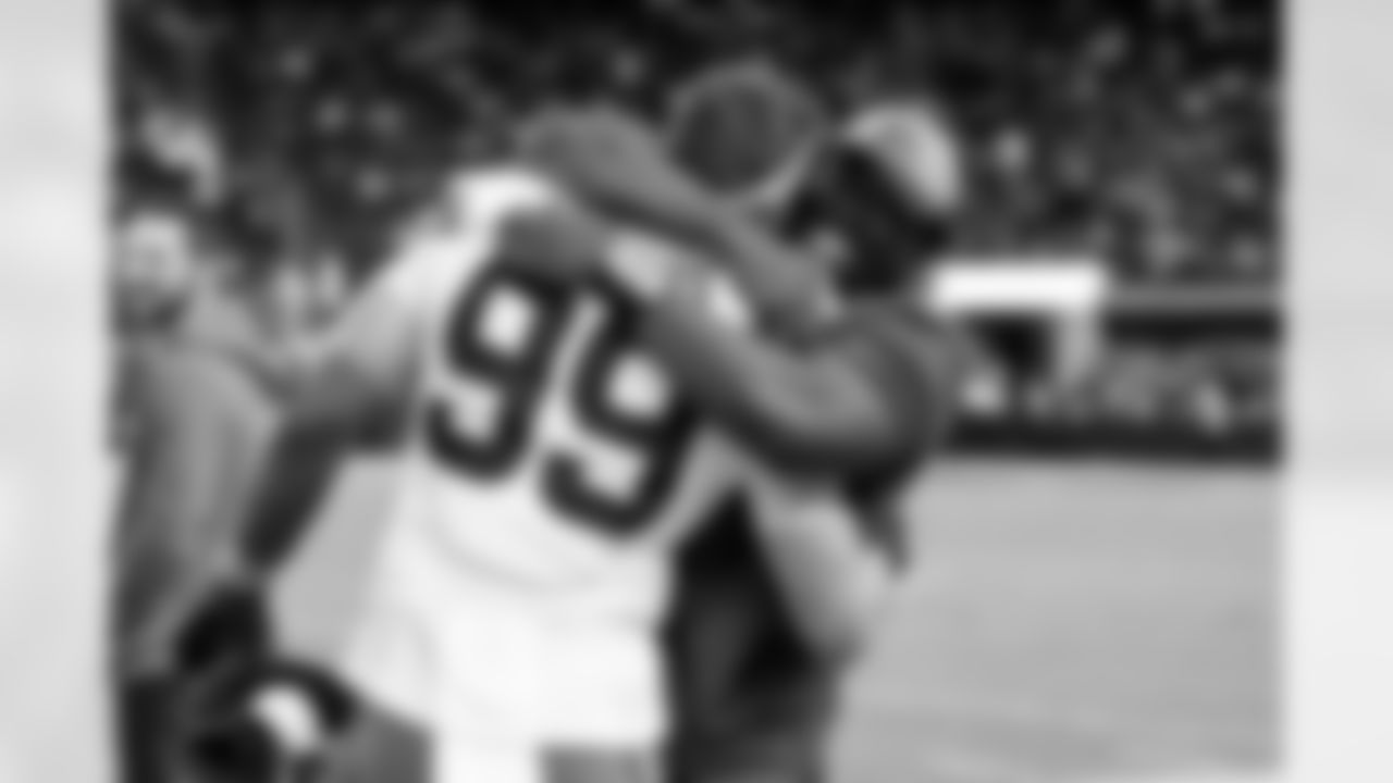 Defensive end Cameron Thomas (99) and Defensive Line Coach Jacques Cesaire during a NFL football game between the Cleveland Browns and Las Vegas Raiders on November 23, 2025 at Allegiant Stadium. The Browns won 24-10.