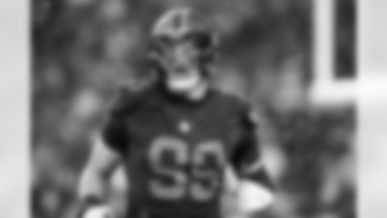 Defensive end Cameron Thomas (99)