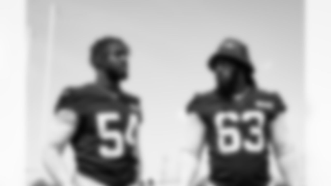 Defensive end Ogbo Okoronkwo (54) and Defensive end Lonnie Phelps (63) during a workout in Phase II of the offseason at CrossCountry Mortgage Campus on April 29, 2024.